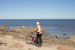 Cyclist at sea.