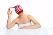 beautiful smiling woman with a sock on her head