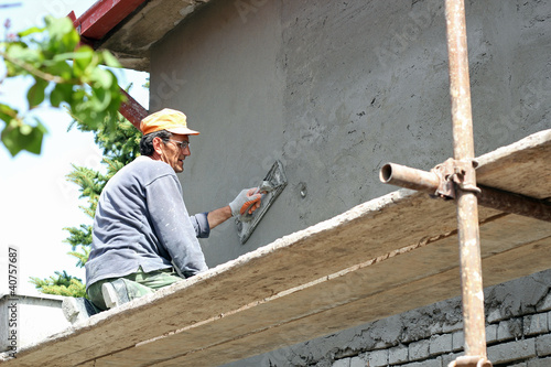 Photo: Plasterer Working Plasterer Working