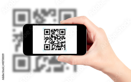 Photo: Scanning QR Code With Mobile Phone Scanning QR Code With Mobile Phone
