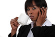 An African American businesswoman over the phone.