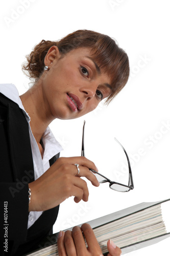 Photo: Businesswoman carrying a binder Businesswoman carrying a binder
