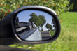 Die Fahrt im Cabrio - Blick in den Seitenspiegel