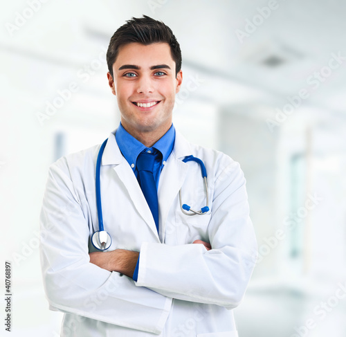 Photo: Handsome young doctor portrait Handsome young doctor portrait