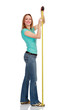 Smiling girl with a tape measure