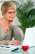 Photo: grandmother using laptop grandmother using laptop
