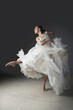 Ballet dancer posing in ornate gown