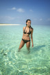 Beautiful sexy girl standing in lagoon (Maldives)