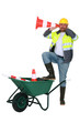 Man with wheelbarrow and traffic cones