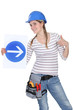 Smiling woman showing road sign