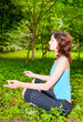 young woman in meditation pose young woman in meditation pose