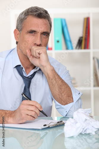 Photo: Man making himself sick from stress Man making himself sick from stress