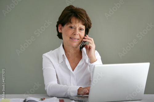 Photo: Female office manager Female office manager