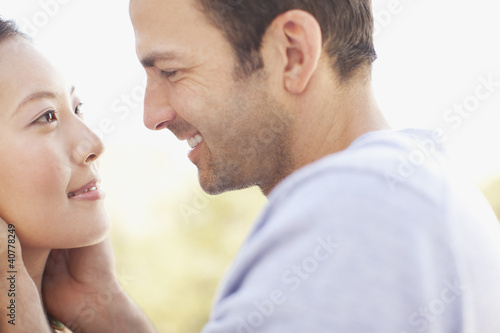 Foto: Close up of smiling couple?s faces Close up of smiling couple?s faces