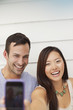 Couple taking picture of themselves