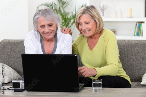 Photo: Women on laptop Women on laptop