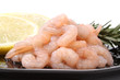 Pile of shrimps over a black dish Pile of shrimps over a black dish