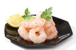 Pile of prawns over a black dish Pile of prawns over a black dish