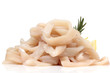 Pile of raw squid rings over white Pile of raw squid rings over white