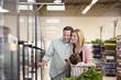 Family shopping together in supermarket