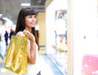 Young girl buying clothes