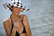 Thumbs up from a woman on the beach Thumbs up from a woman on the beach