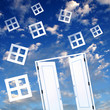 White door against blue sky background White door against blue sky background