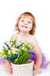 Photo: beautiful little girl with flowers beautiful little girl with flowers