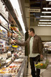 Man shopping in supermarket