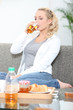 Woman drinking apple juice with breakfast Woman drinking apple juice with breakfast