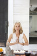Woman meditating with candles