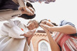 Low angle view of family praying together
