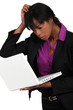A bewildered businesswoman