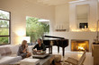 Couple drinking tea in modern living room