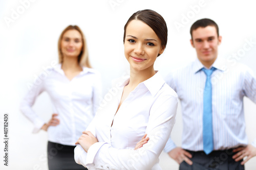 Photo: three successful young business persons together three successful young business persons together