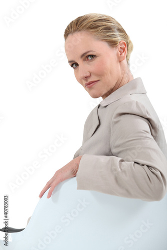 Photo: businesswoman on chair businesswoman on chair