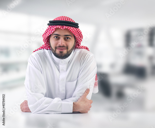 Photo: arabian business man / executive in his office arabian business man / executive in his office