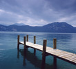 Foto: Wooden pier in still rural lake Wooden pier in still rural lake