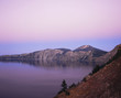 Rocky mountains reflected in still lake