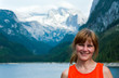 Alpine summer lake and woman portrait