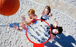 Basketball hoop and teenagers