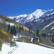 Photo: Trees and mountaintop in snowy rural landscape Trees and mountaintop in snowy rural landscape