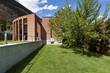 modern bricks house, surrounded by nature