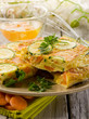 omelette with carrot zucchinis and parsley
