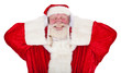 Weihnachtsmann hält sich die Ohren zu