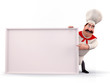 Happy chef pointing towards sign