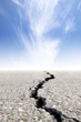 cracked road with cloud background