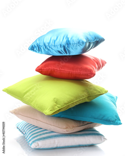 Photo: bright pillows isolated on white bright pillows isolated on white