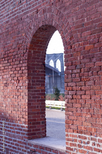Photo: Brooklyn Bridge framed through brick window Brooklyn Bridge framed through brick window