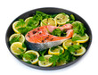 Red fish with lemon, parsley and pepper